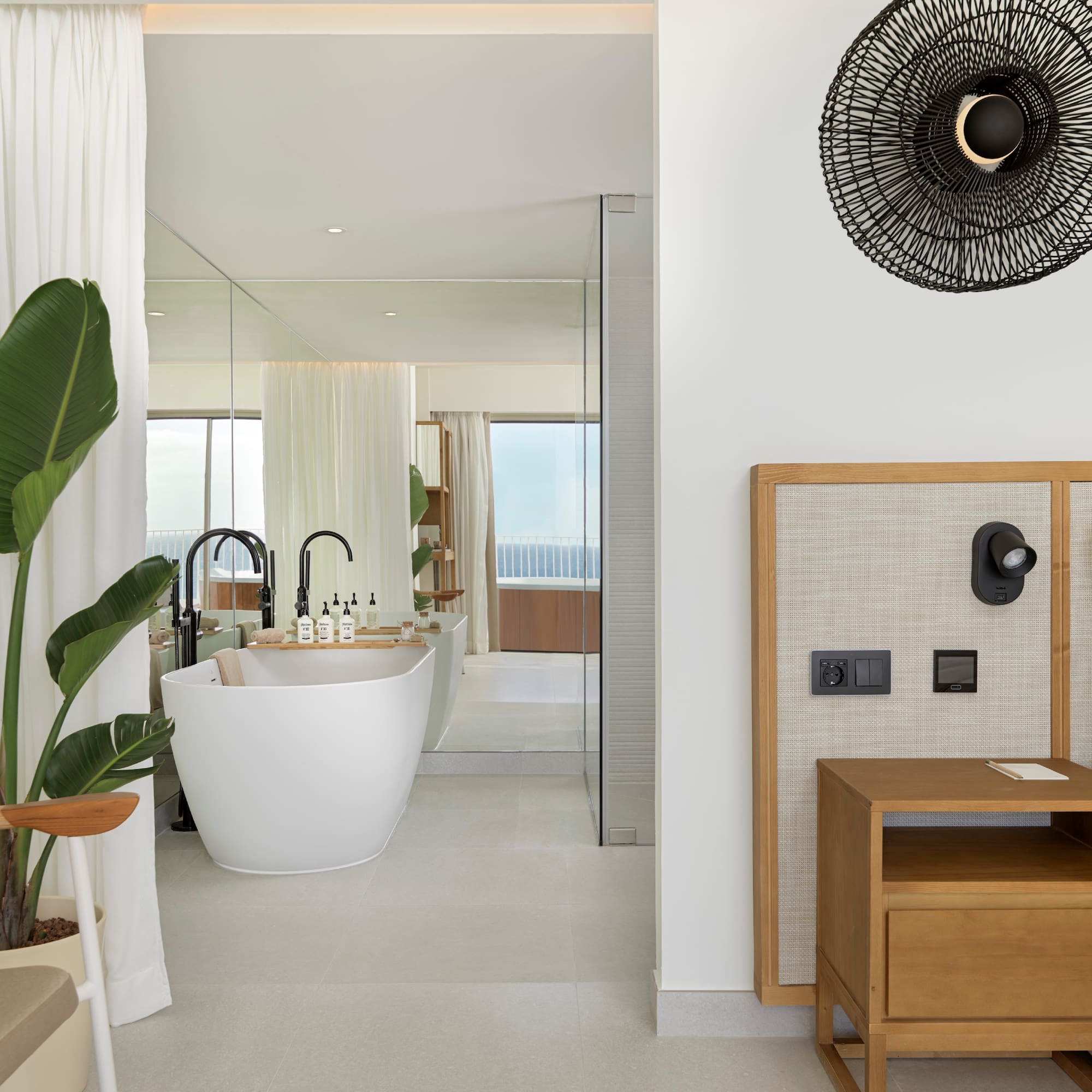 a bathroom with a tub and a sink