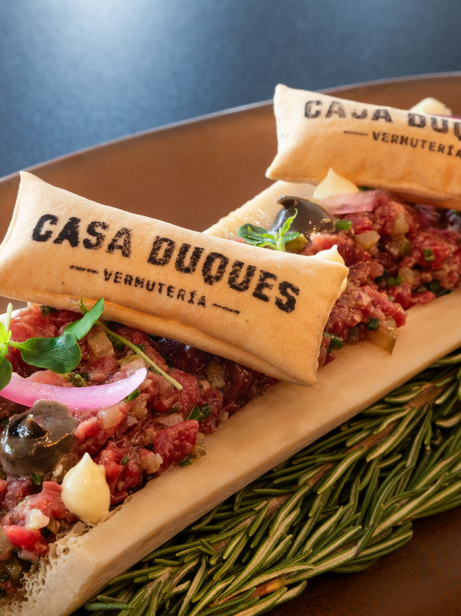 a plate of food with a couple of small bags of food