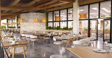 a restaurant with tables and chairs