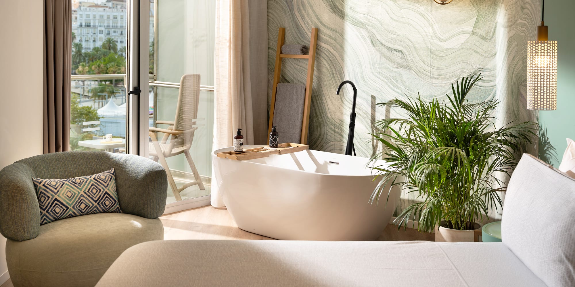 a room with a tub and a chair