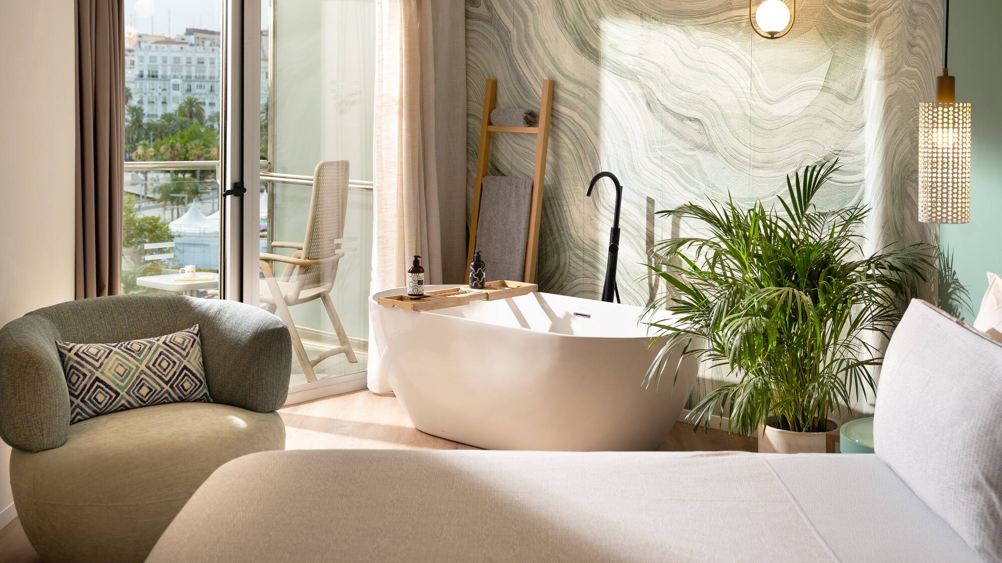 a room with a tub and a chair