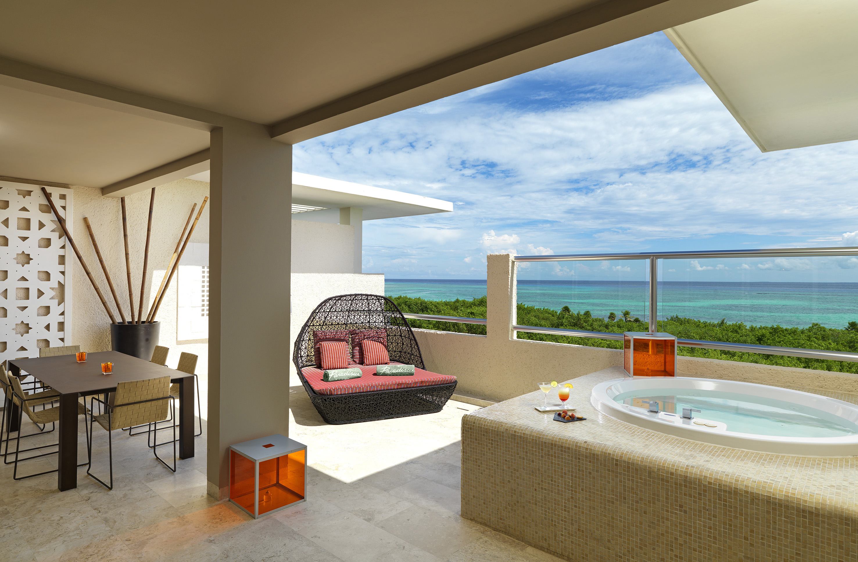 Oceanfront resort balcony with private hot tub, daybed, and dining area. - Family Concierge Presidential Suite - Paradisus Playa del Carmen - Riviera Maya, Playa del Carmen