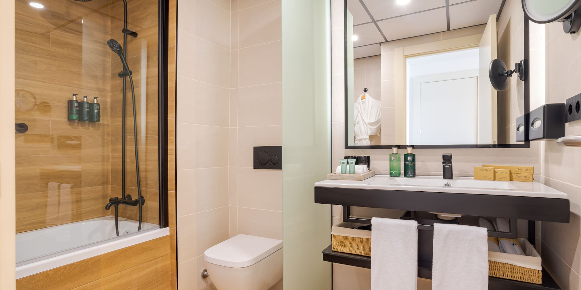 a bathroom with a shower and sink