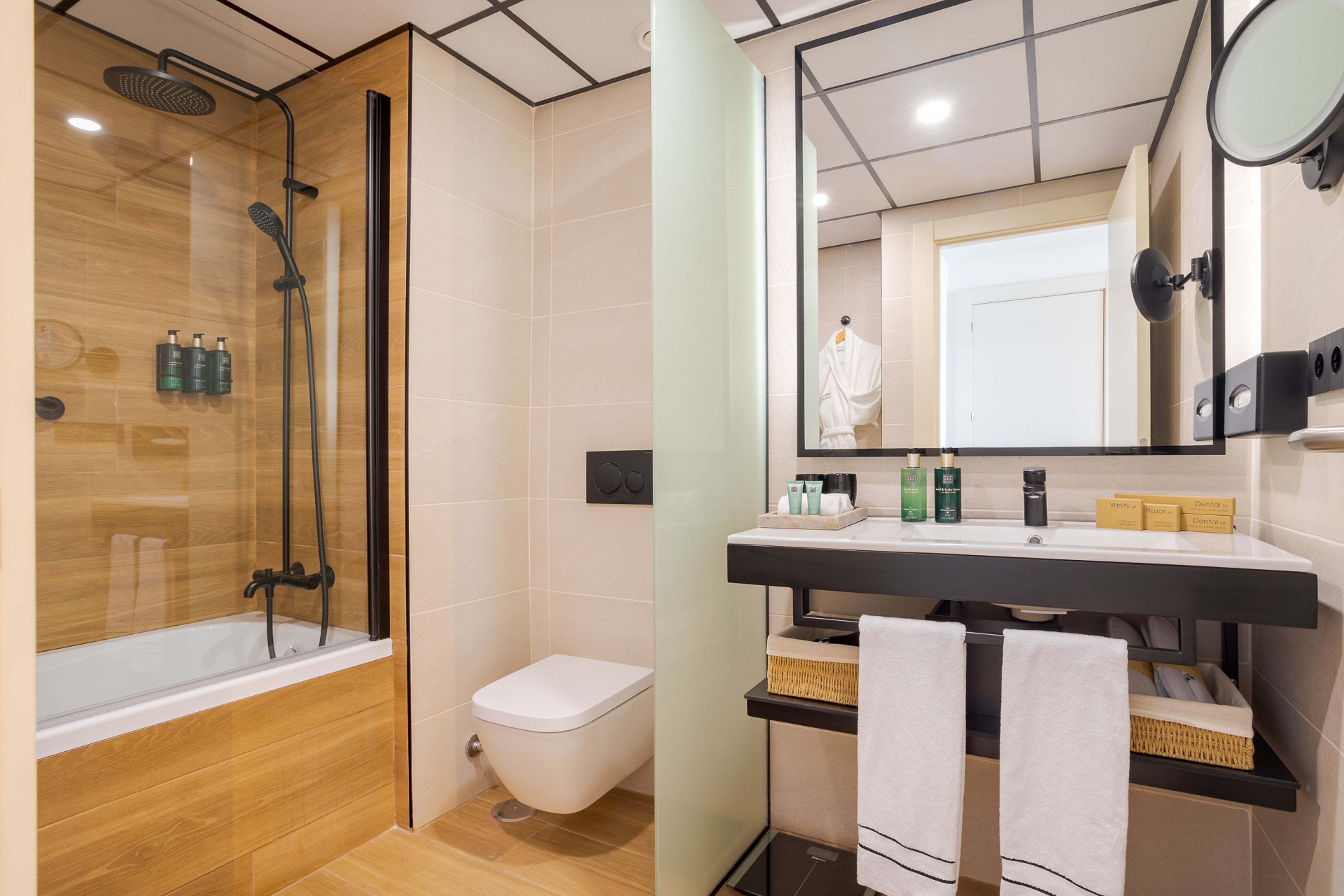 a bathroom with a shower and sink