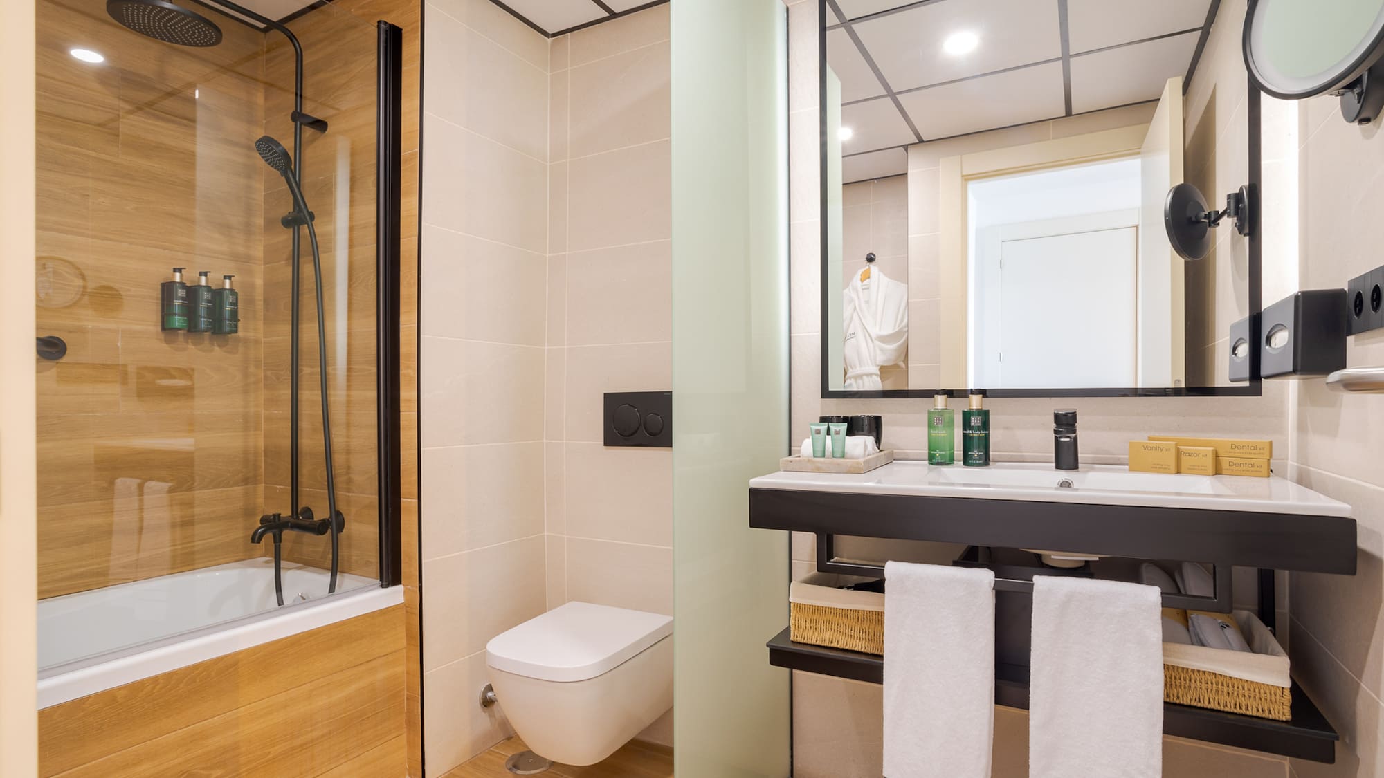 a bathroom with a shower and sink