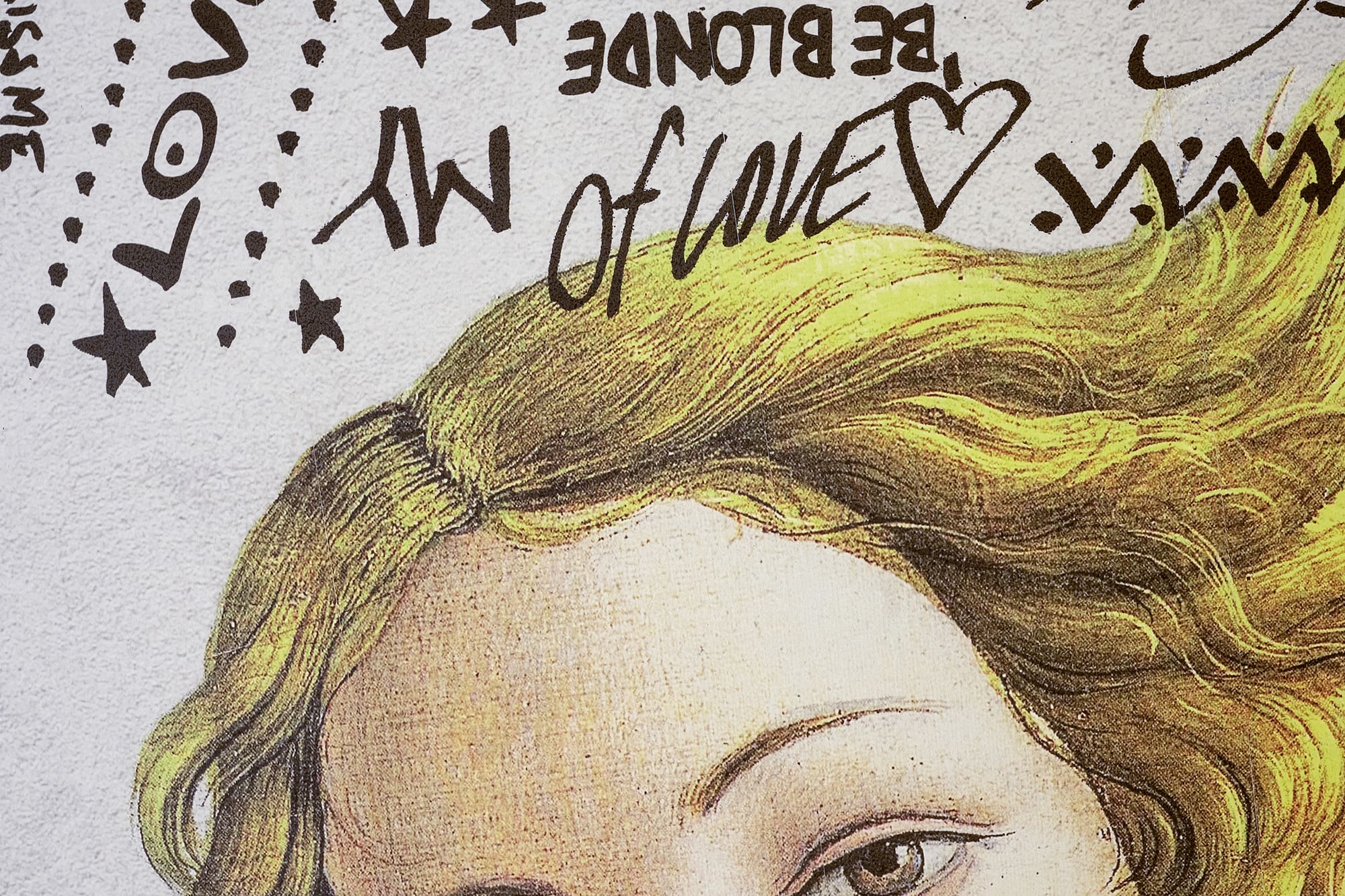 Pop art Botticelli Venus illustration with blonde hair, red lips, and graffiti text.