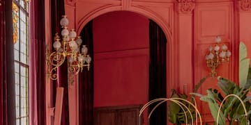 a room with a large ceiling and a couch