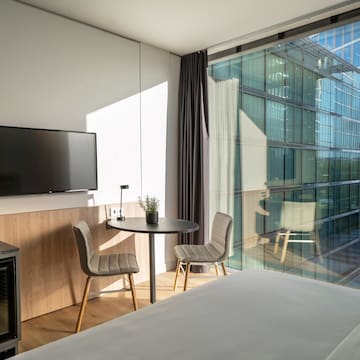 a room with a television and a table