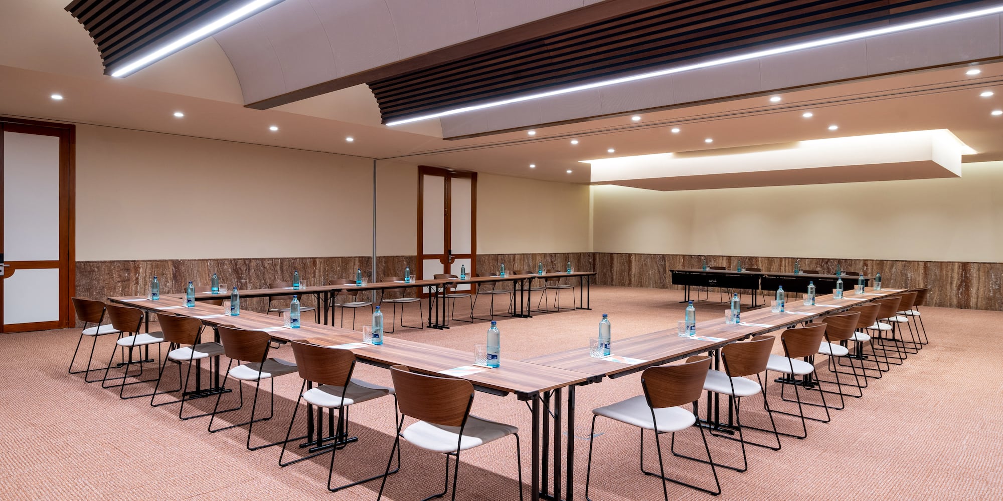 a room with tables and chairs