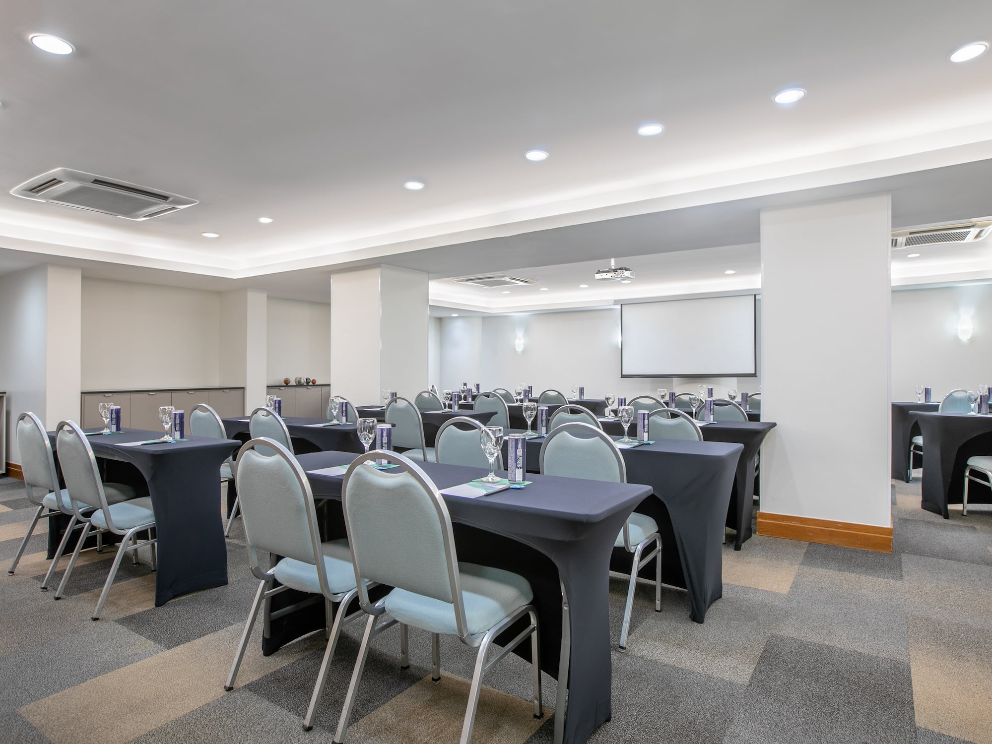 a room with tables and chairs