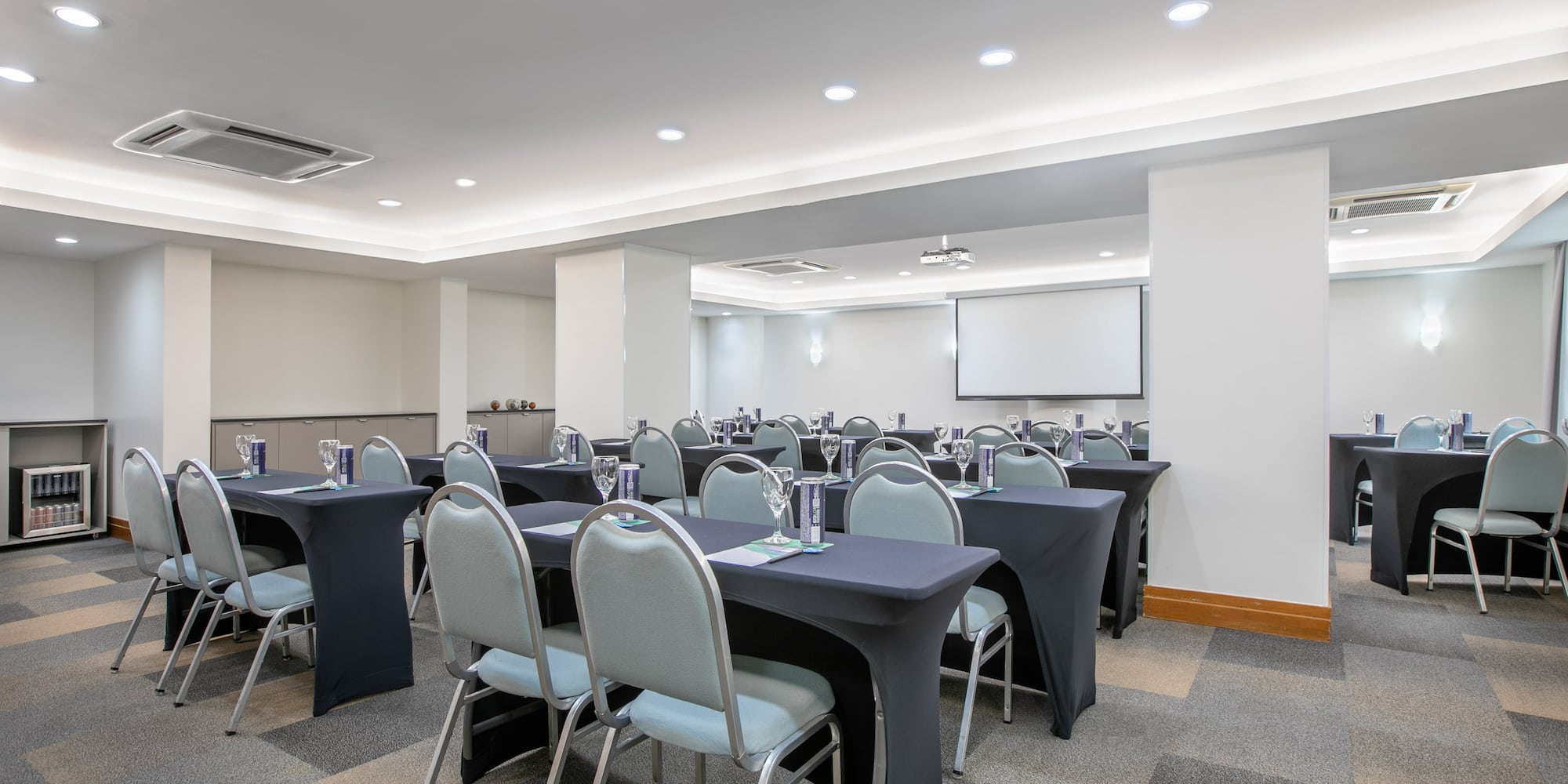 a room with tables and chairs