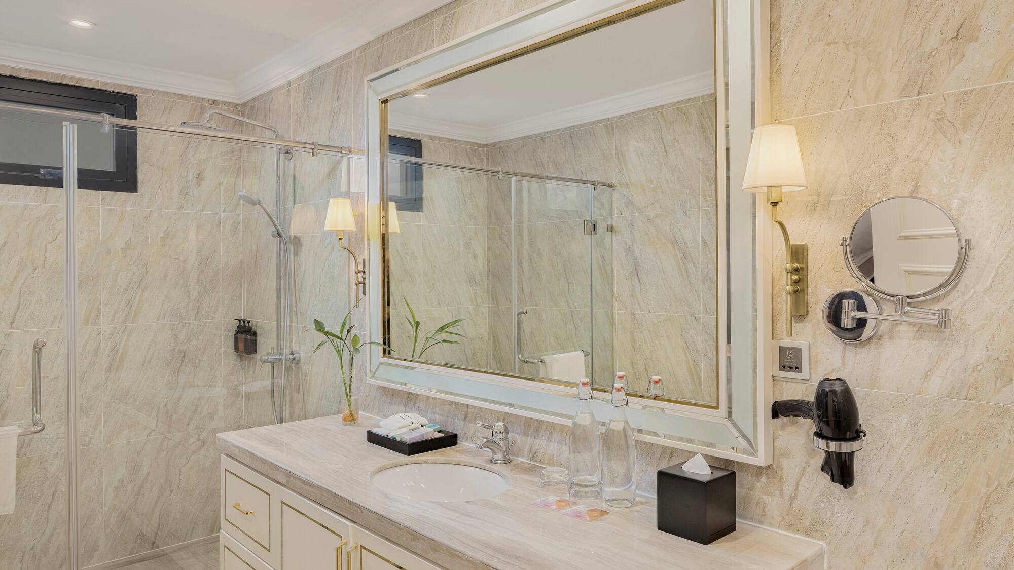 a bathroom with a large mirror