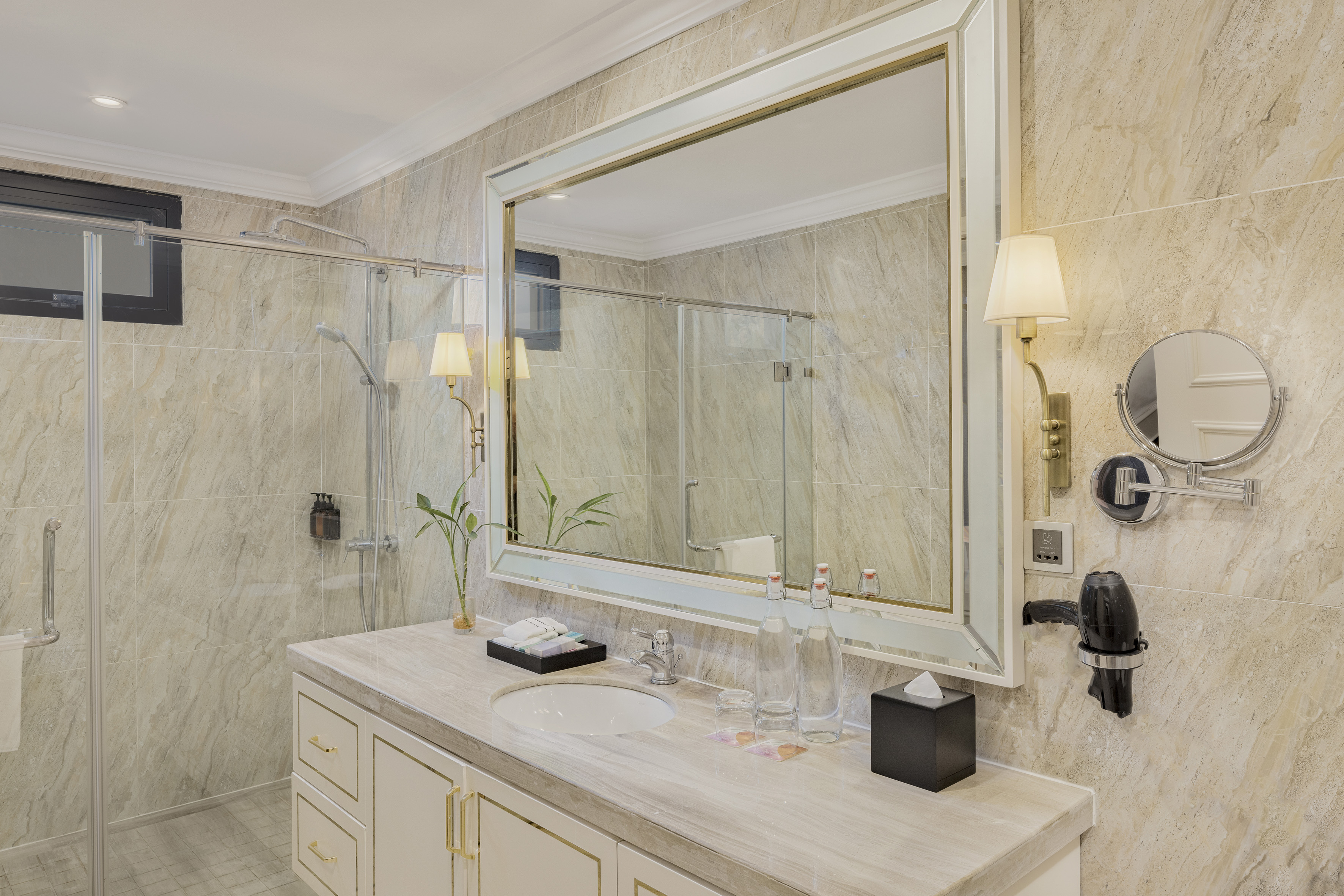 a bathroom with a large mirror