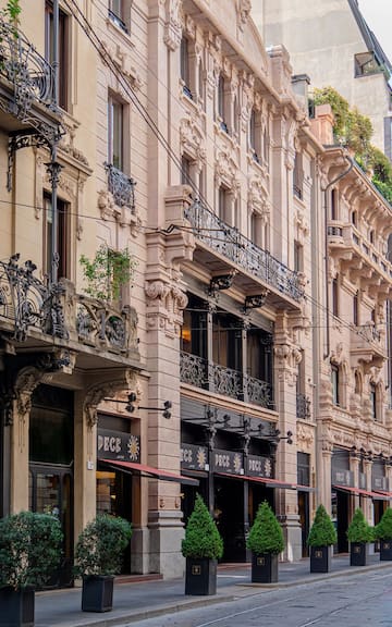 a row of buildings with a balcony