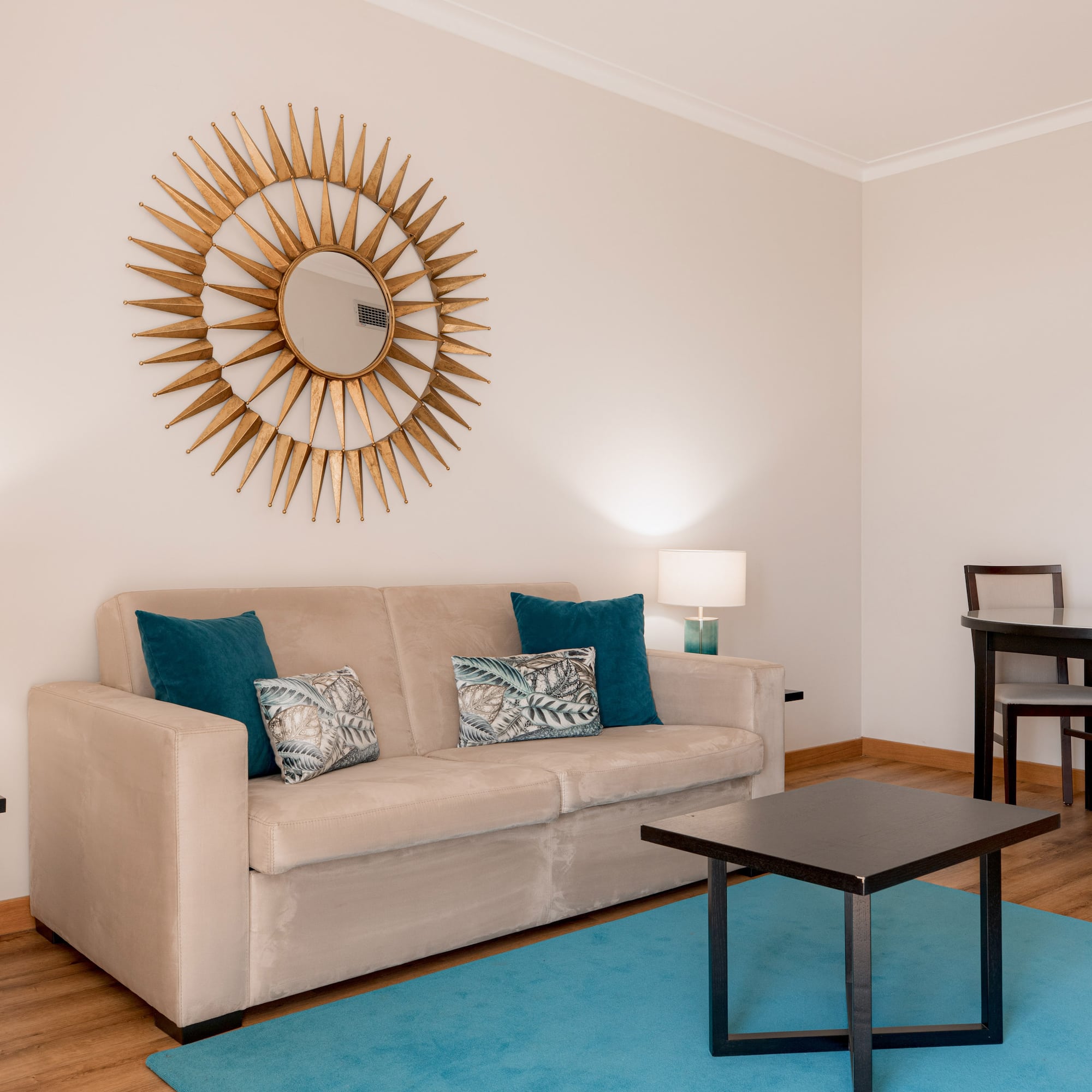 a living room with a couch and table