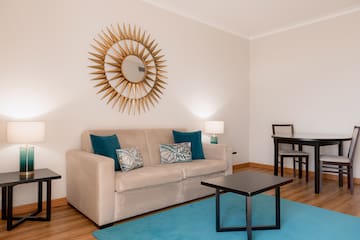 a living room with a couch and table