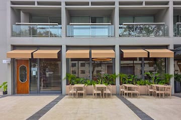 a building with tables and chairs