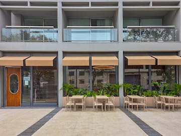 a building with tables and chairs