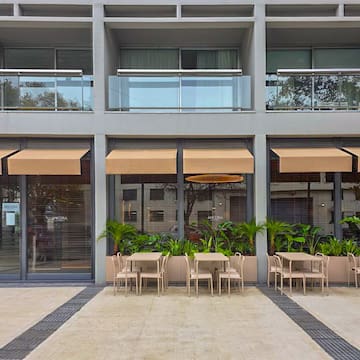 a building with tables and chairs