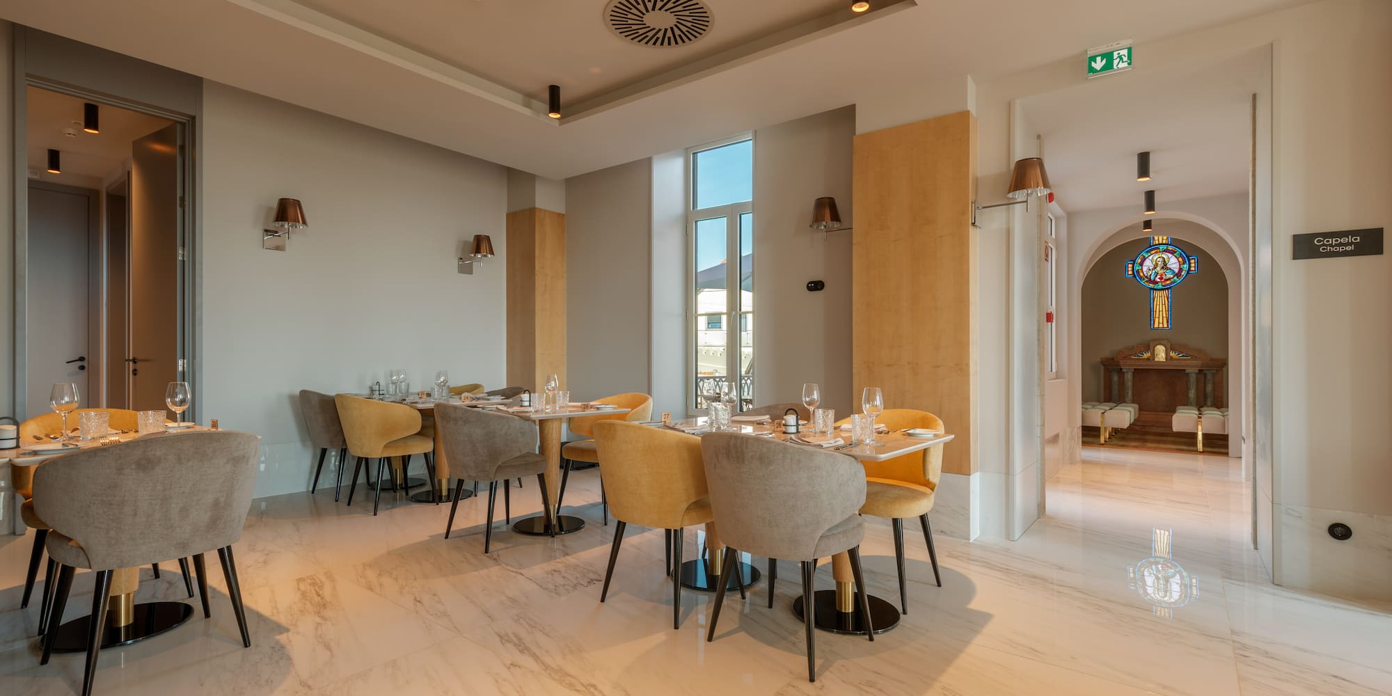 a room with tables and chairs