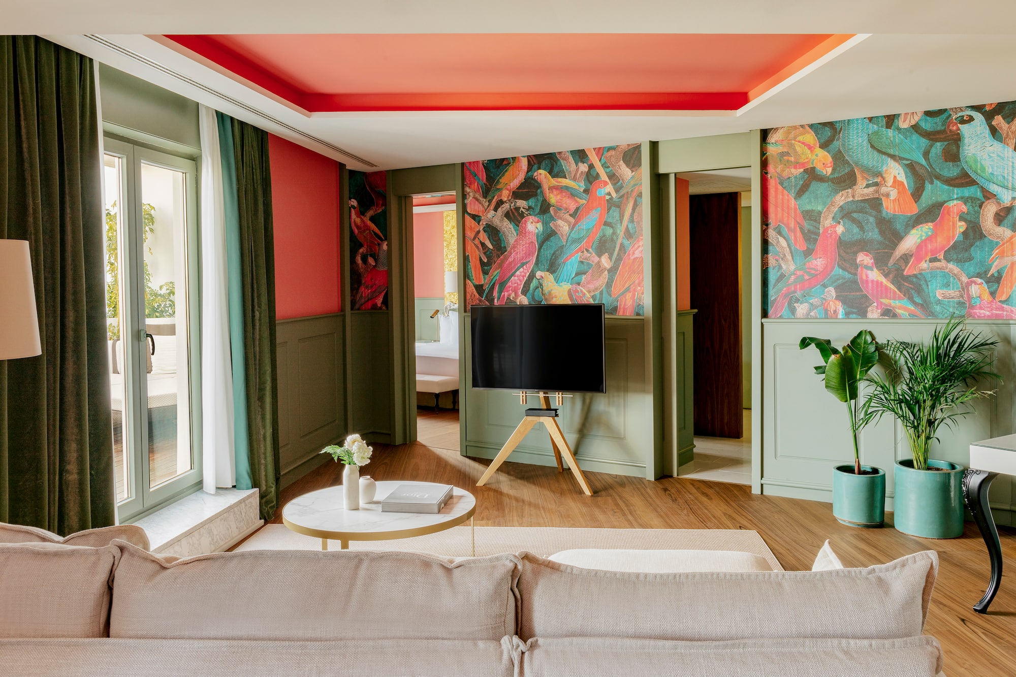 a living room with a tv and a table