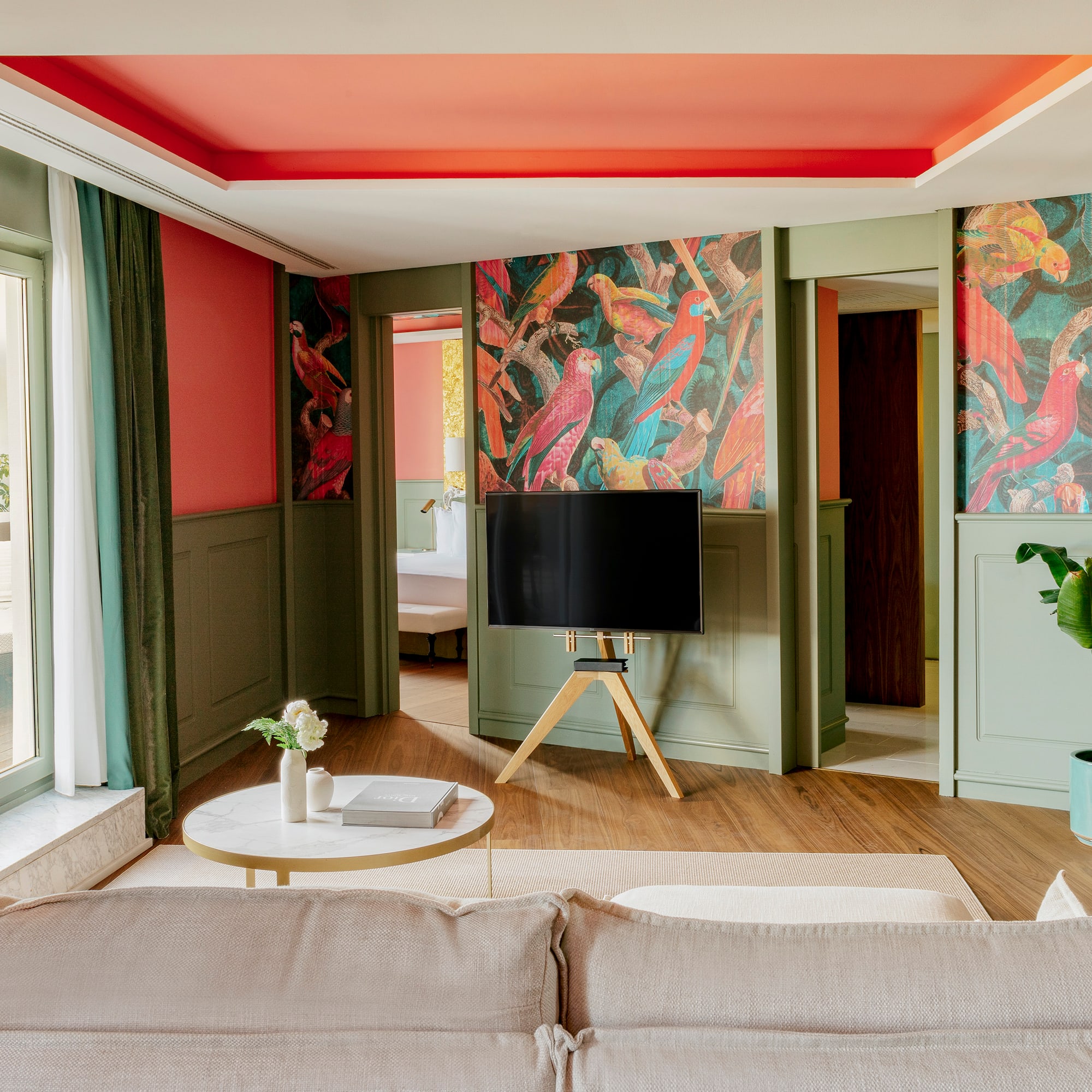 a living room with a tv and a table