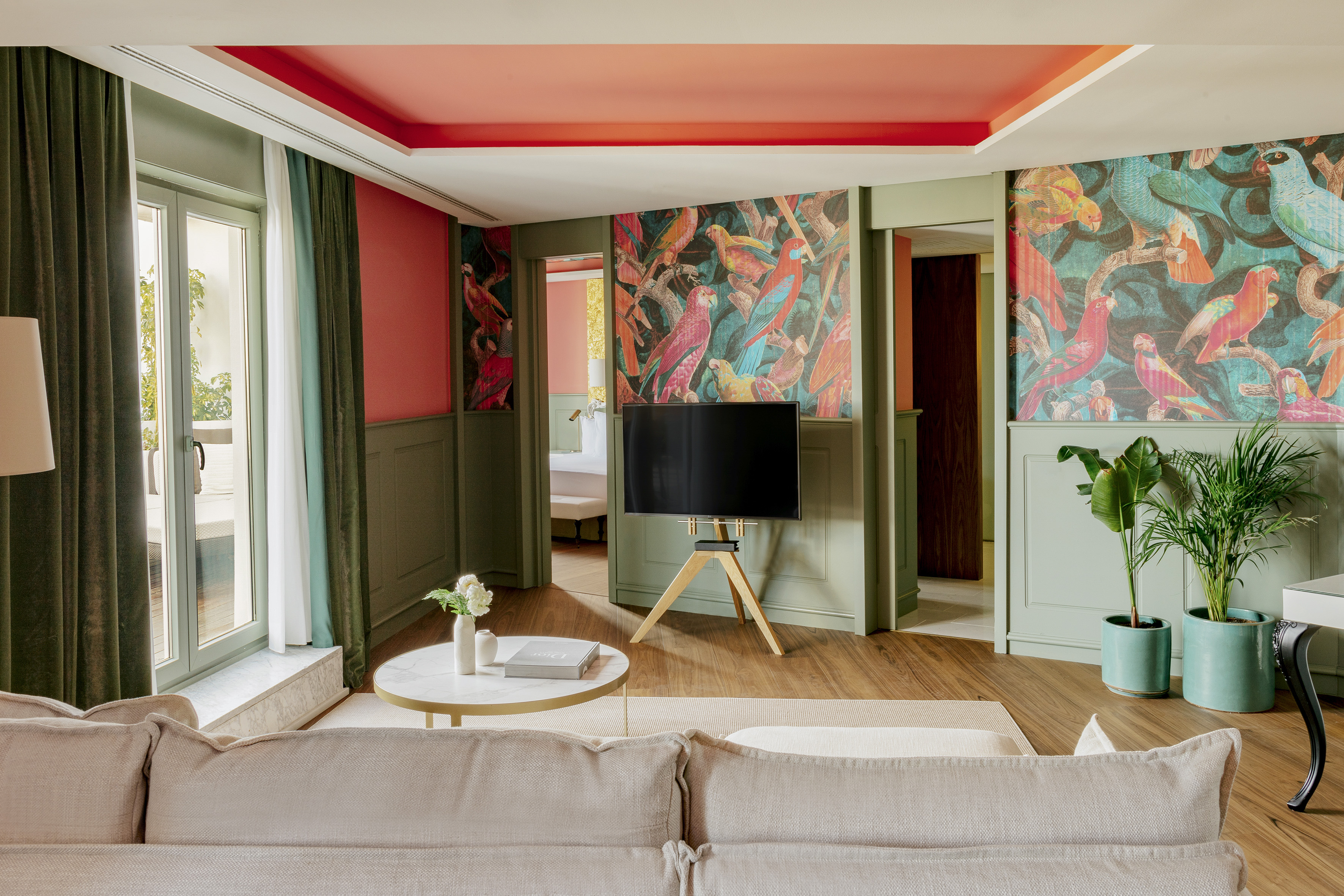 a living room with a tv and a table