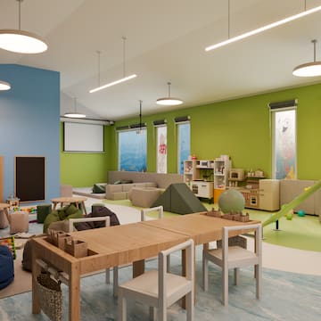 a room with a table and chairs