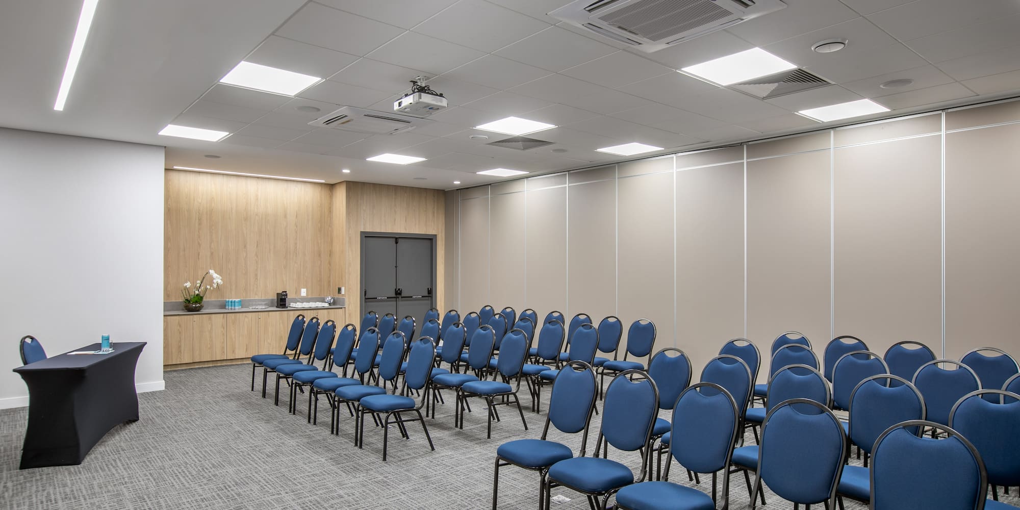 a room with blue chairs