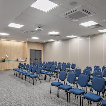 a room with blue chairs