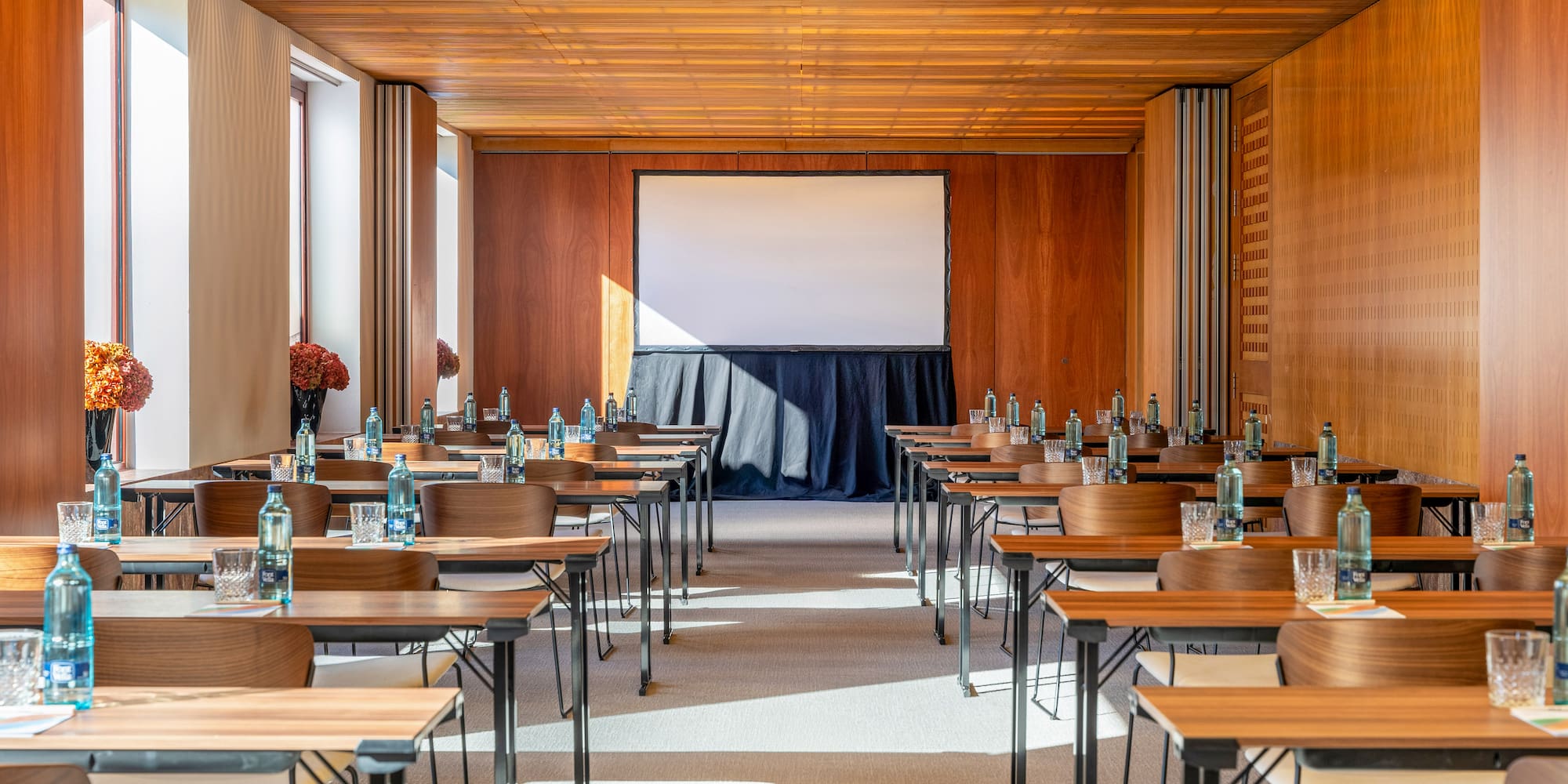 a room with tables and chairs