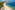 Playa Punta Cana: arena blanca, palmeras, mar azul turquesa y tumbonas.