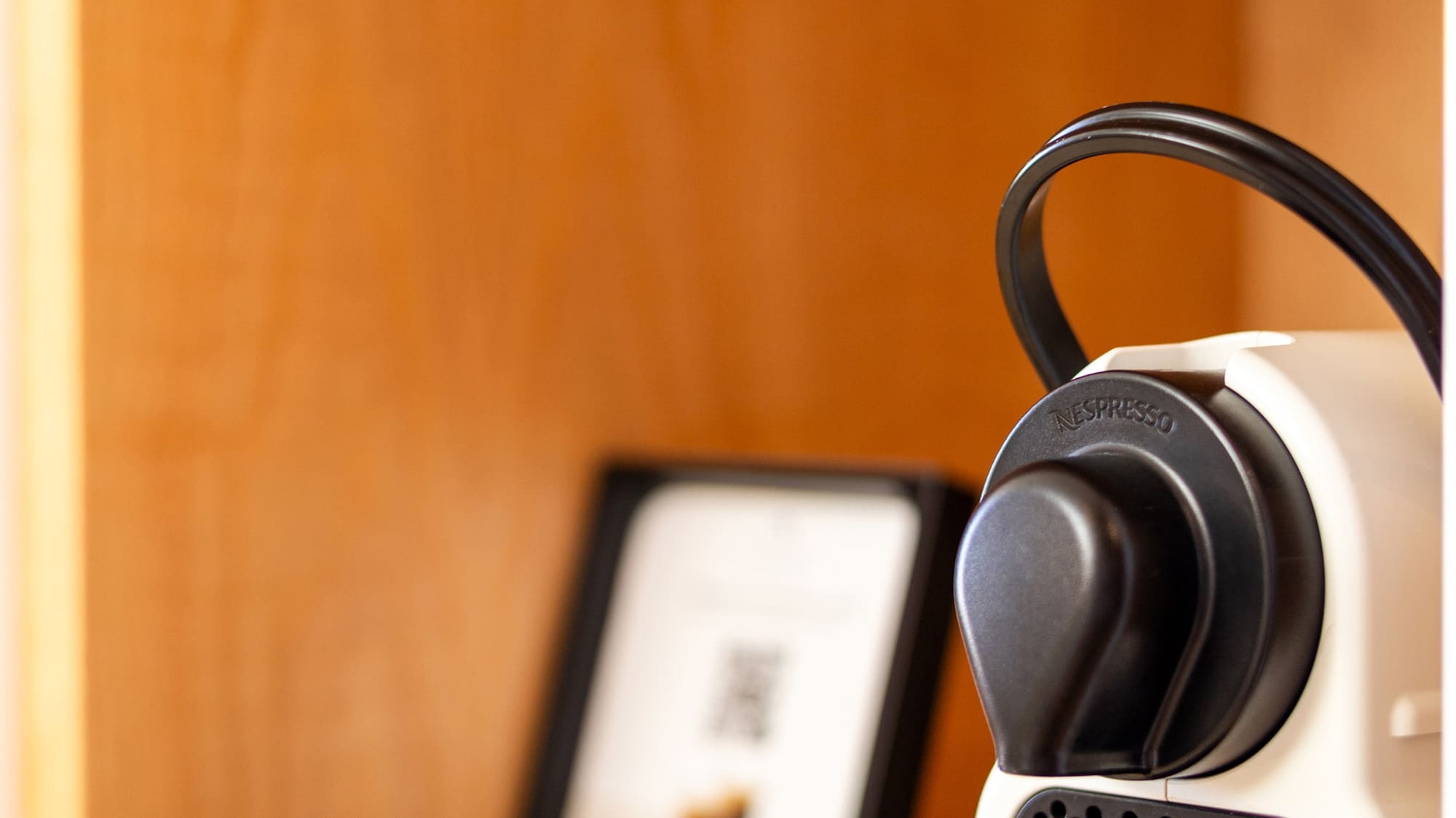 a white and black coffee machine