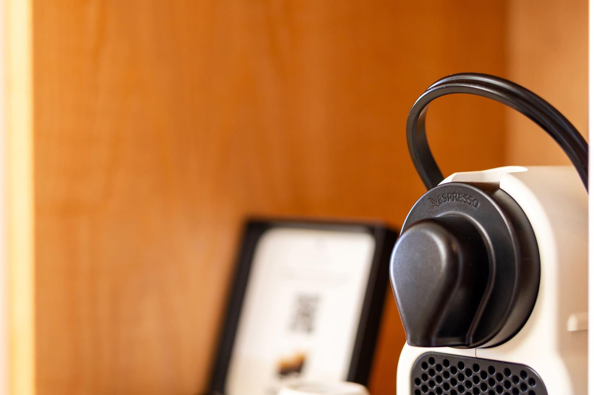 a white and black coffee machine