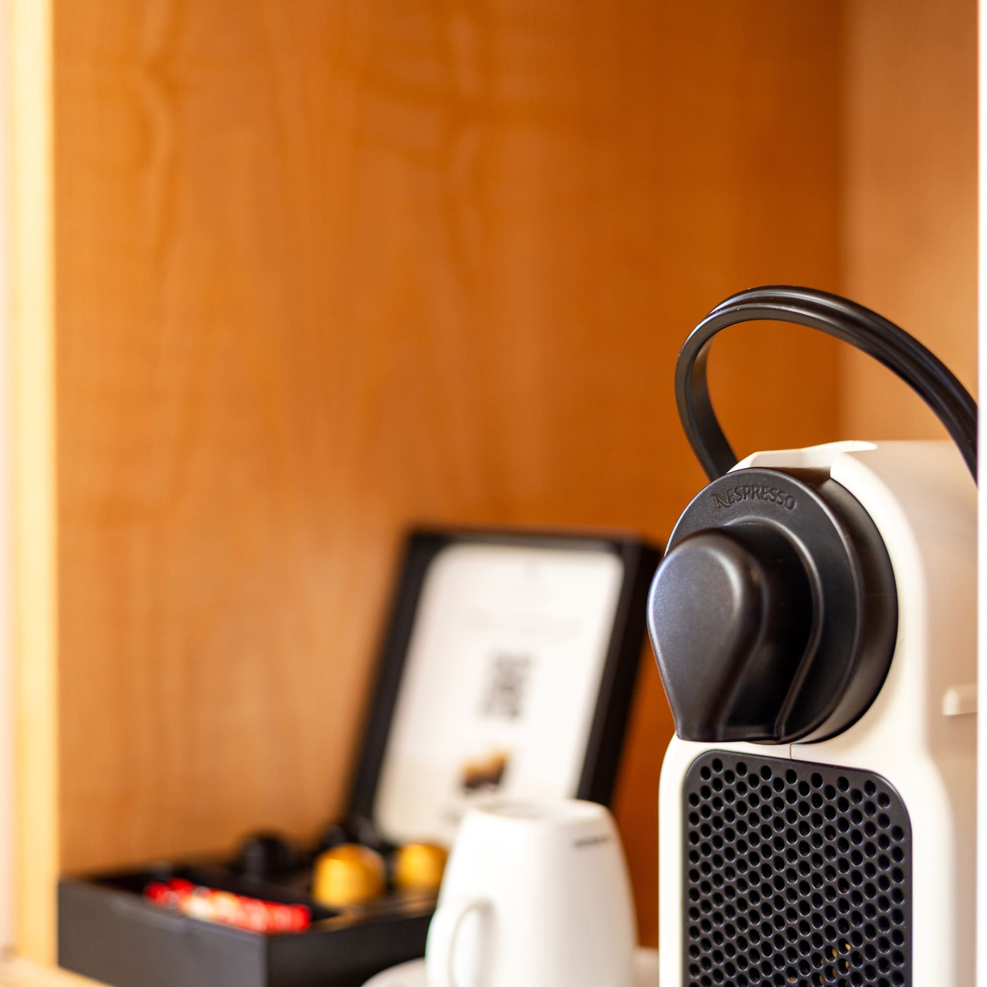 a white and black coffee machine