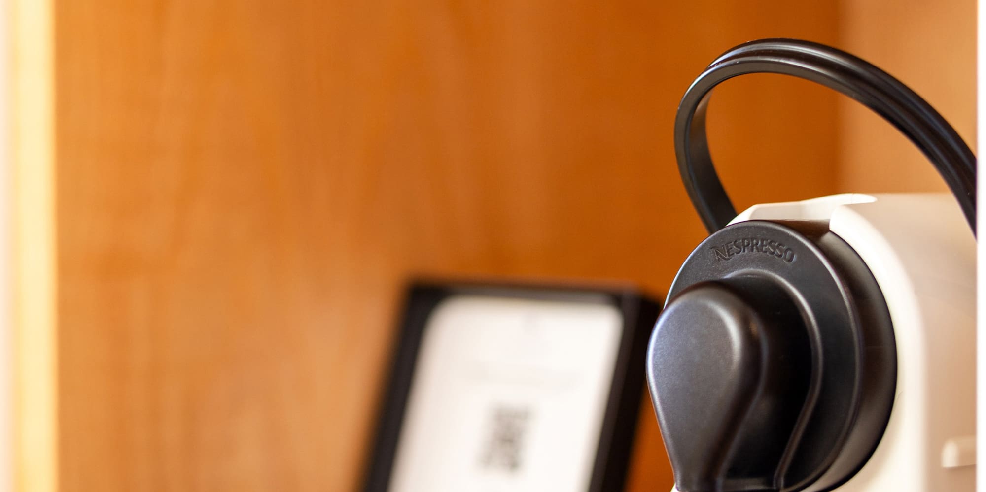 a white and black coffee machine