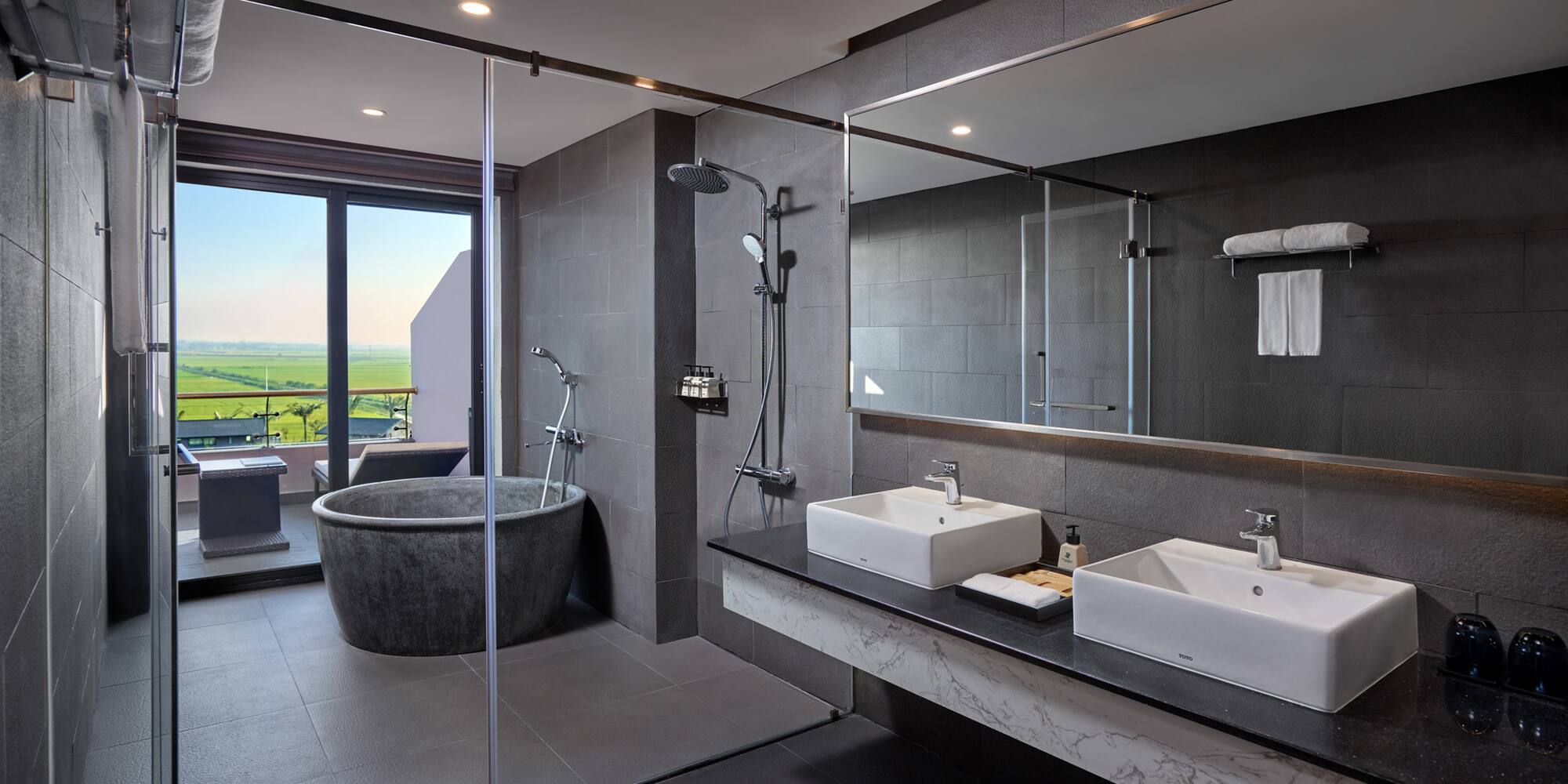 a bathroom with a tub and sink