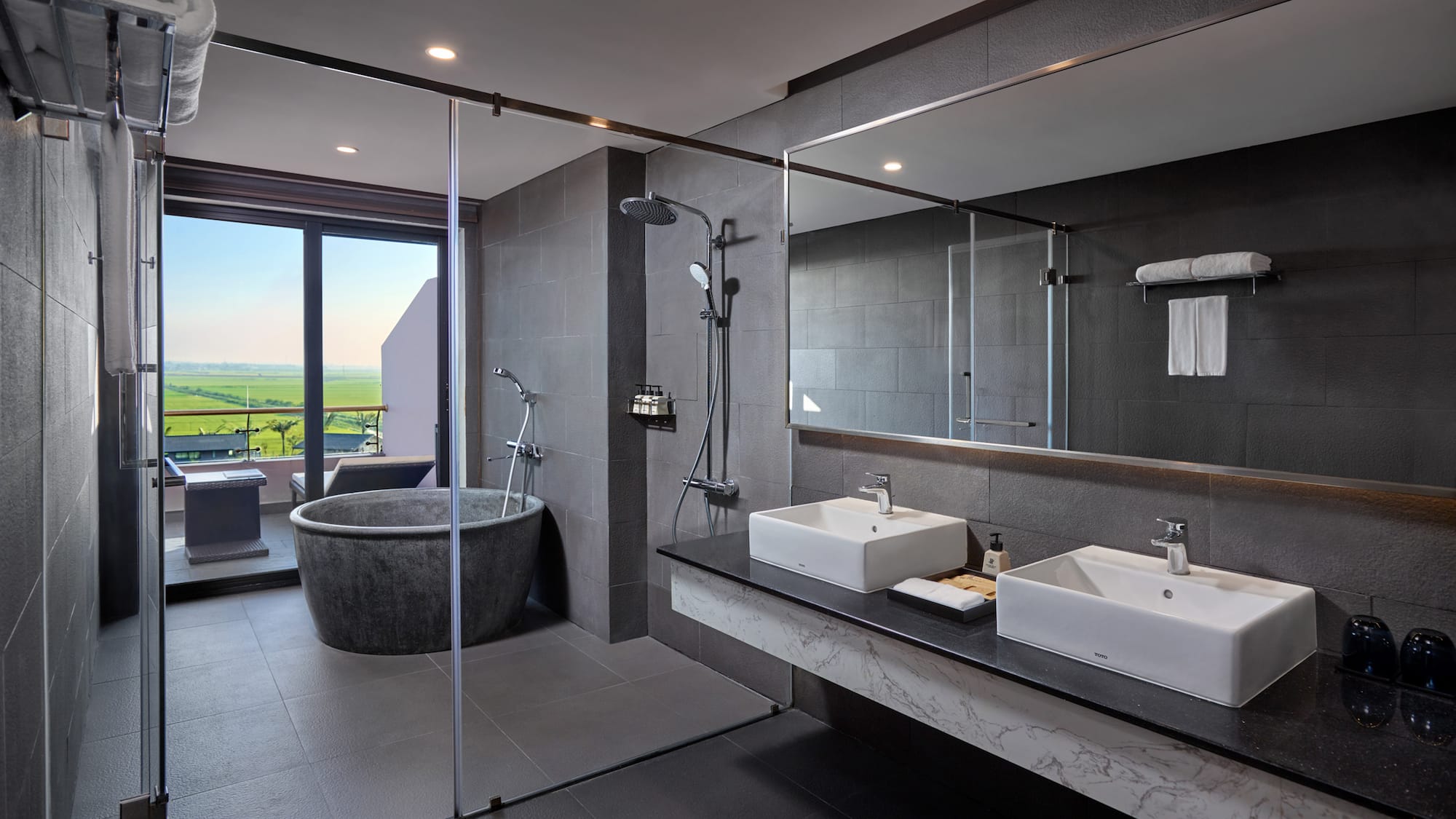 a bathroom with a tub and sink