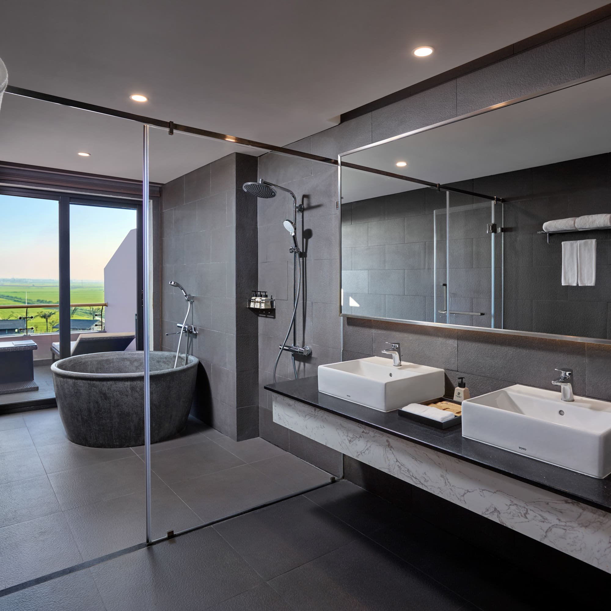 a bathroom with a tub and sink