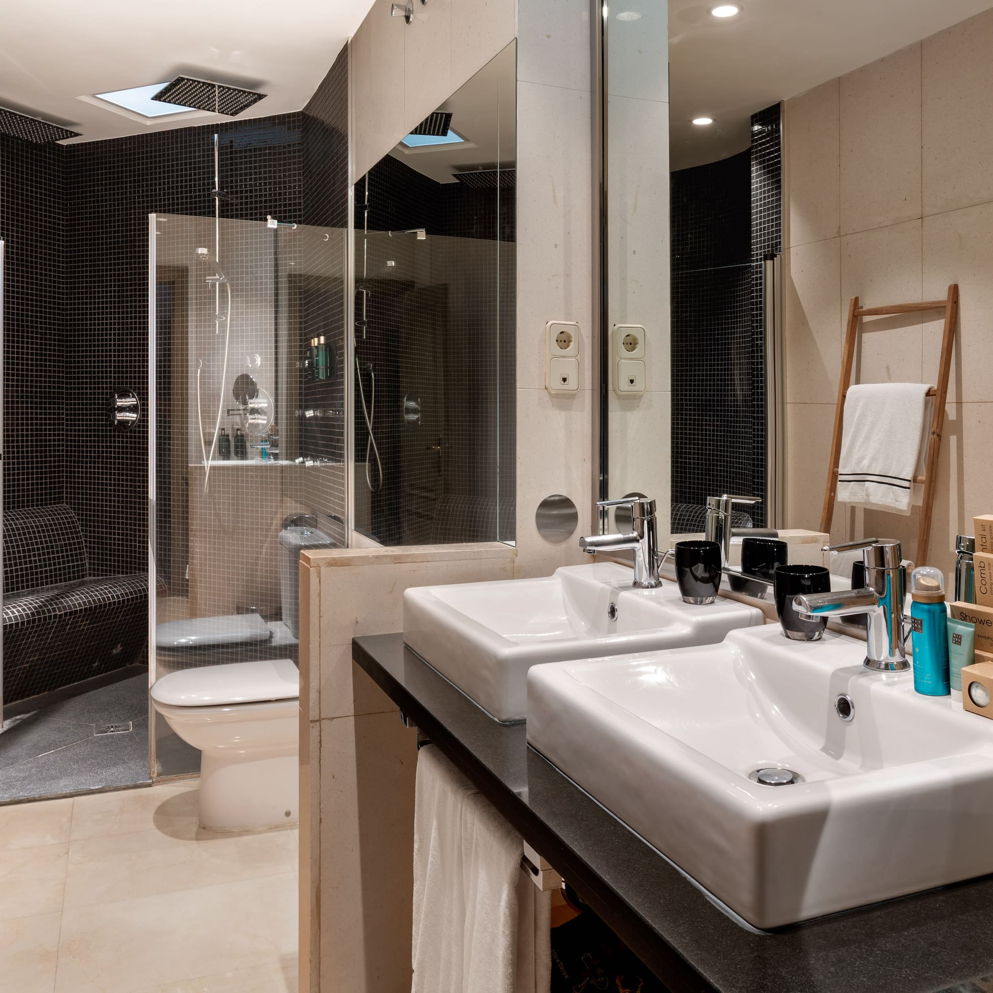 a bathroom with a shower and sink