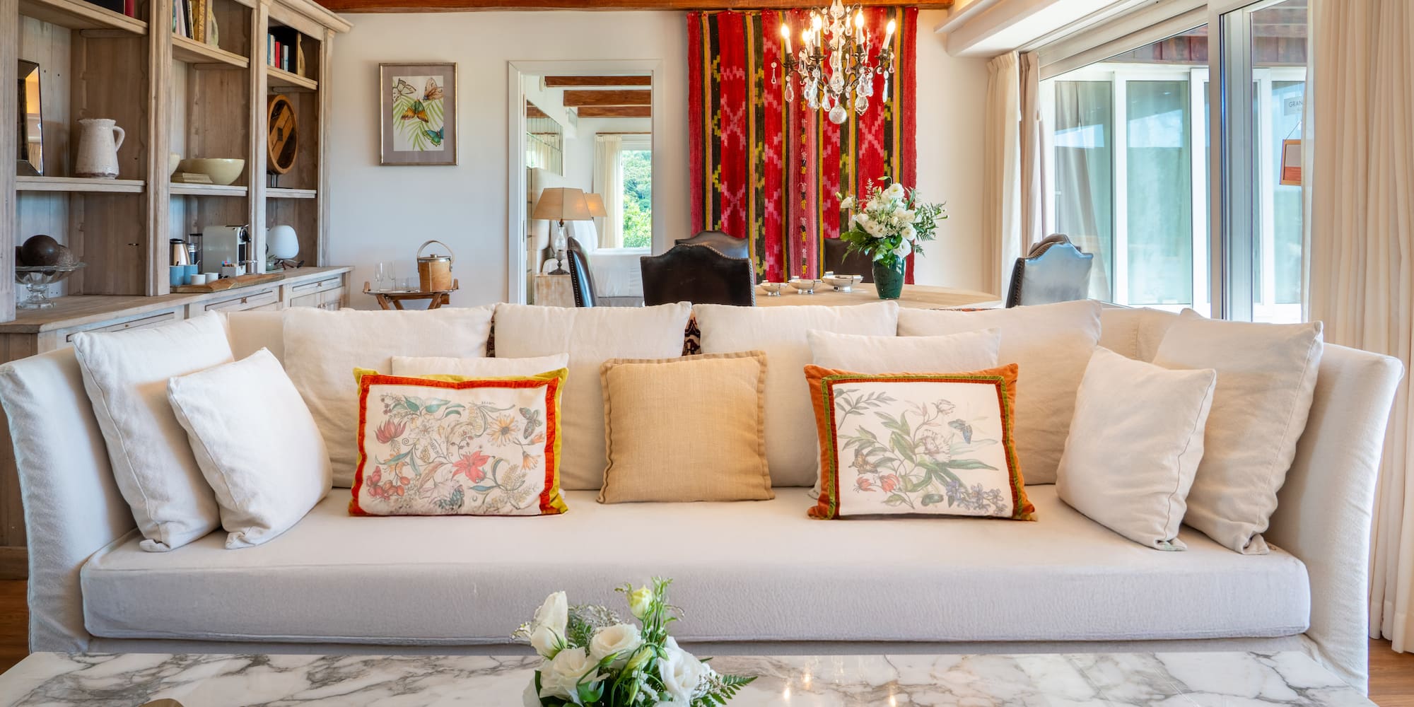 a living room with a couch and a table