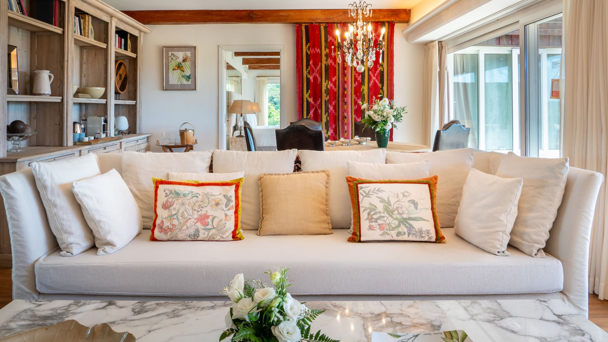 a living room with a couch and a table