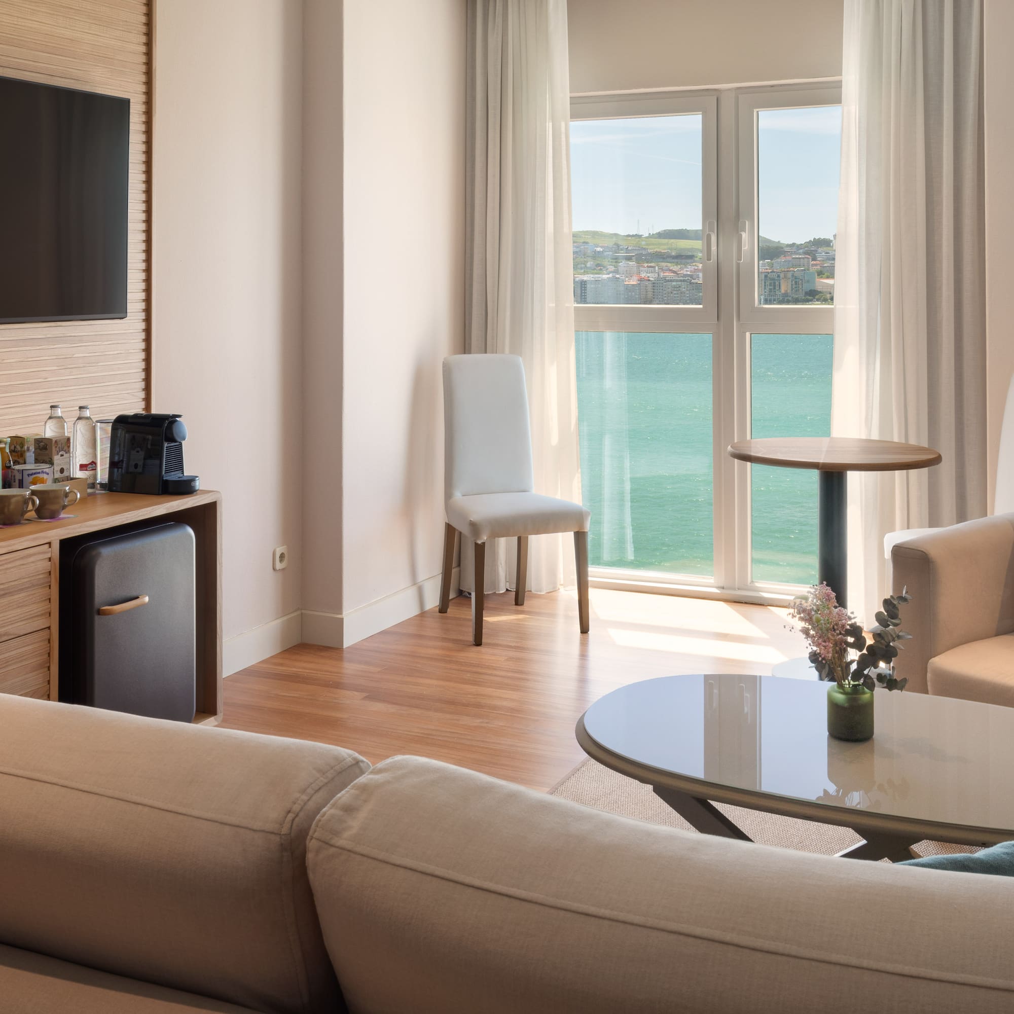 a room with a television and a table