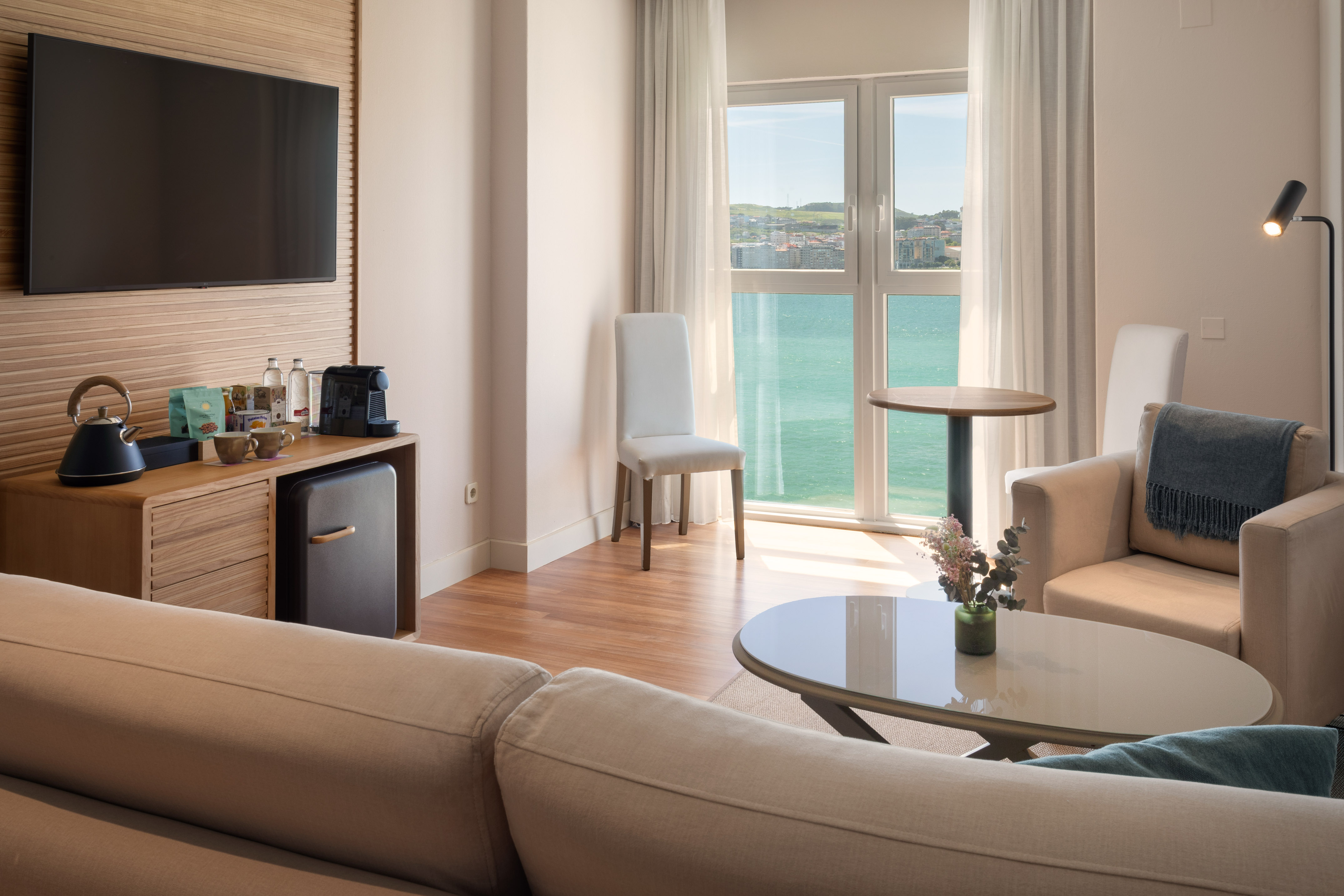 a room with a television and a table