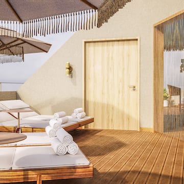 a deck with chairs and umbrellas