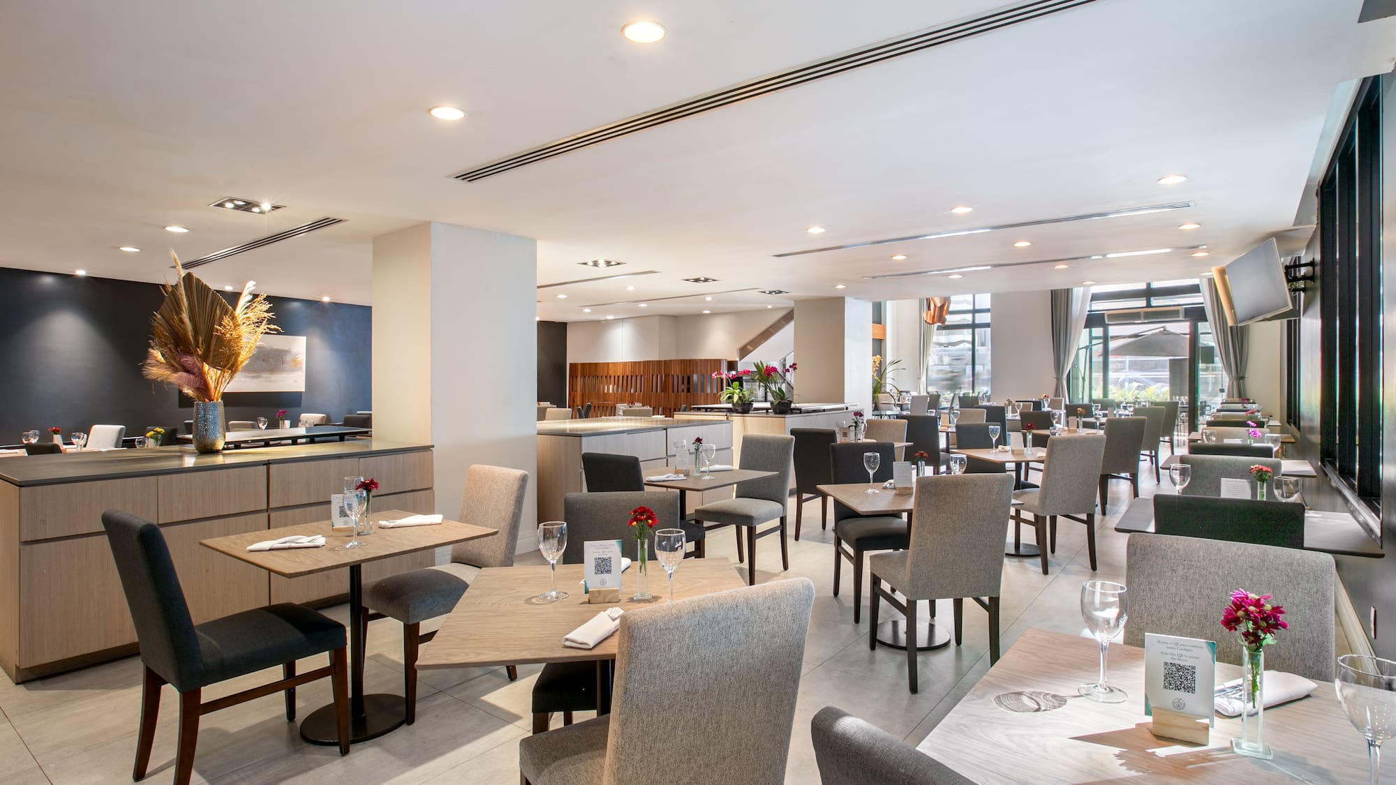 a restaurant with tables and chairs