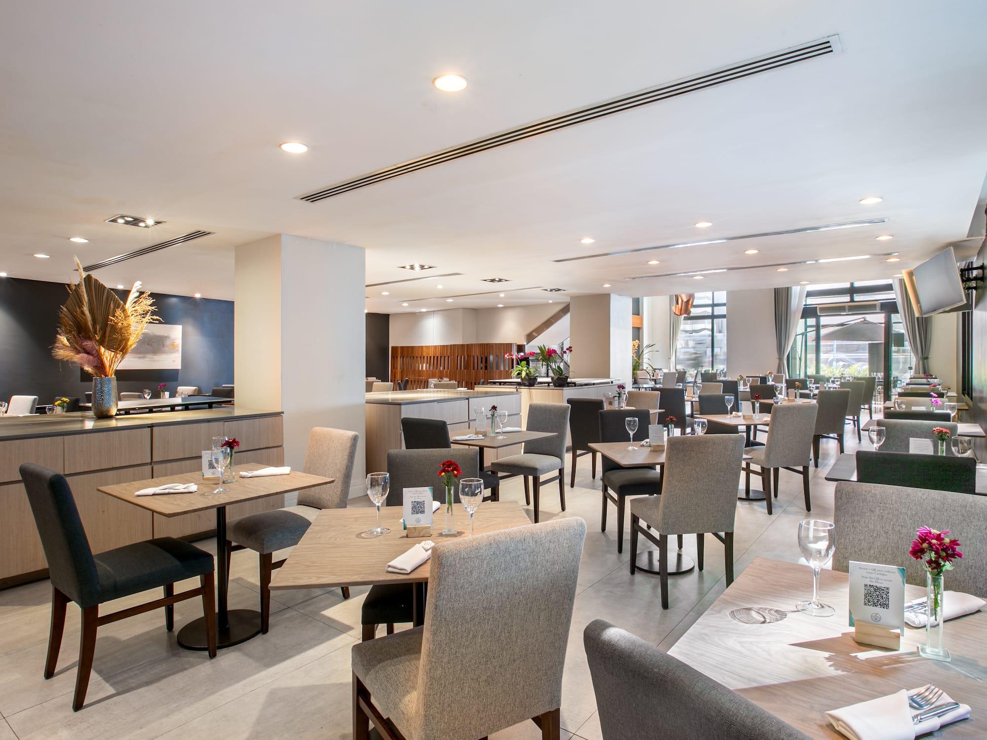 a restaurant with tables and chairs