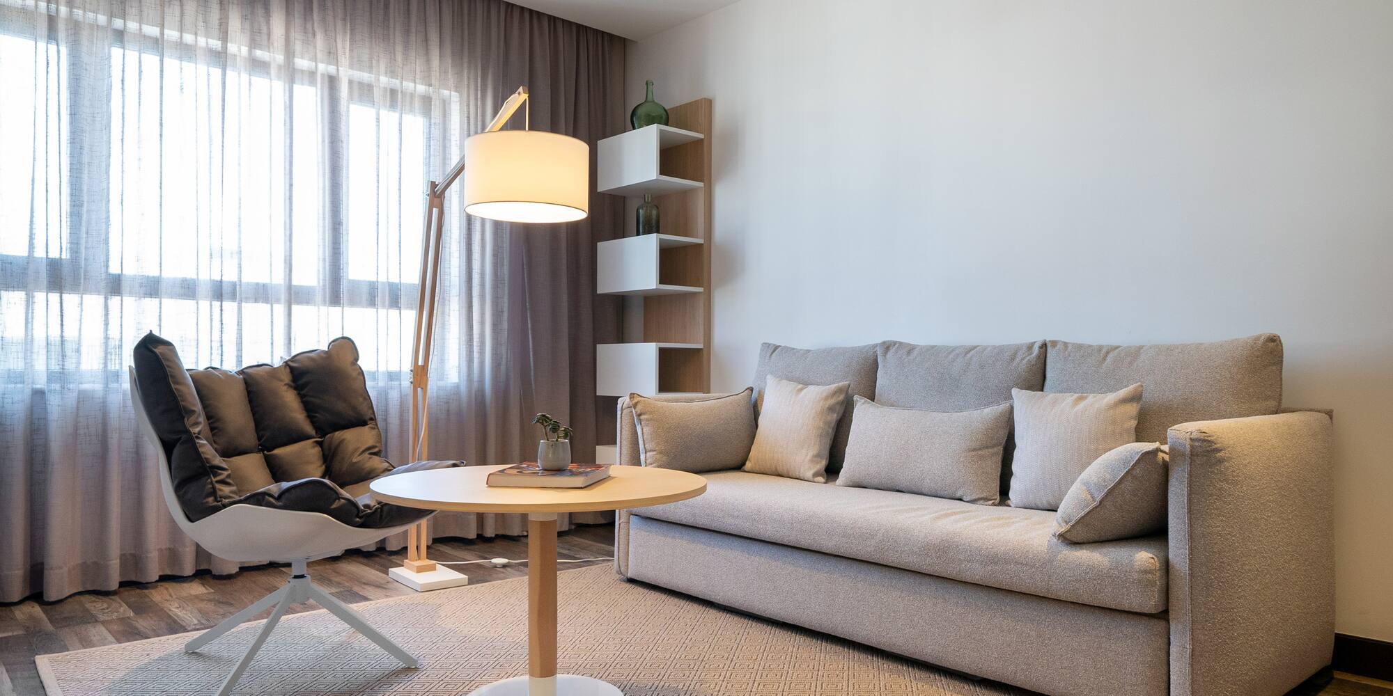 a living room with a couch and a table