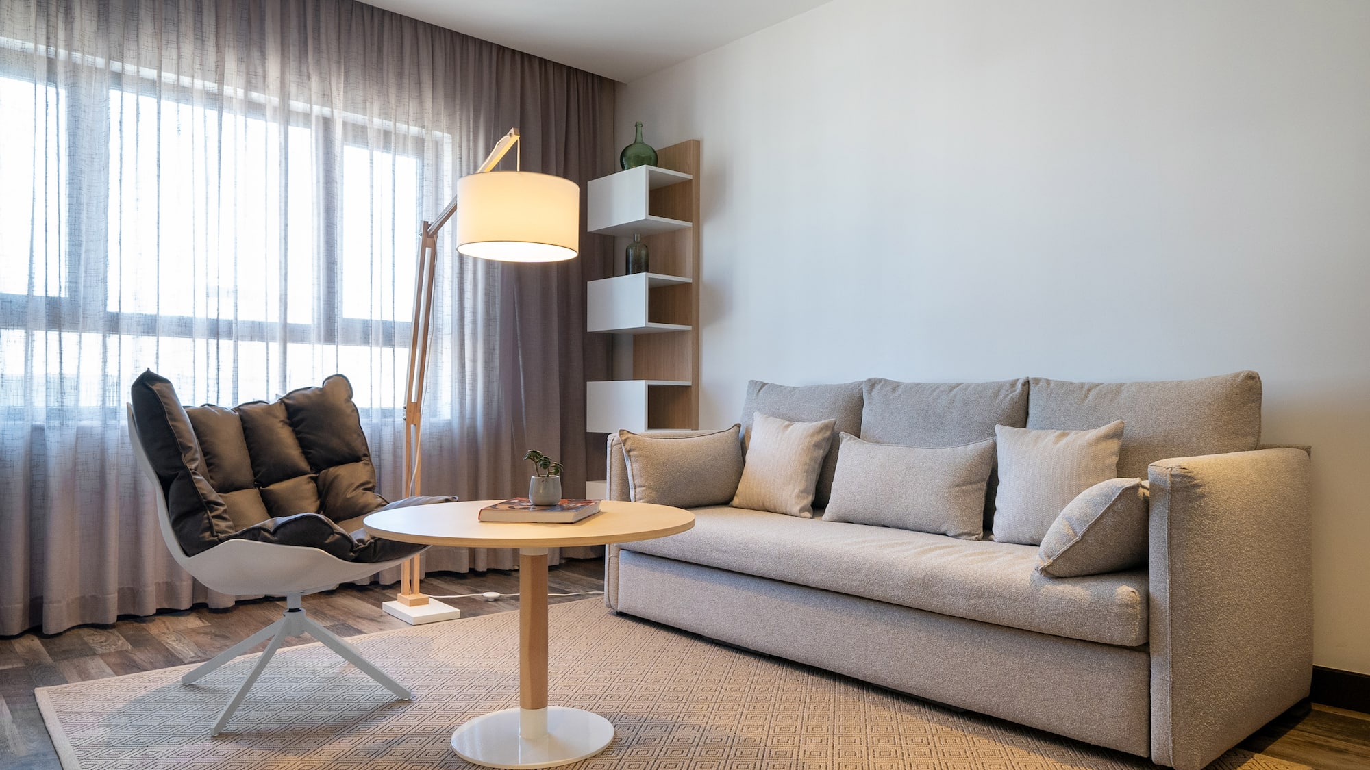 a living room with a couch and a table