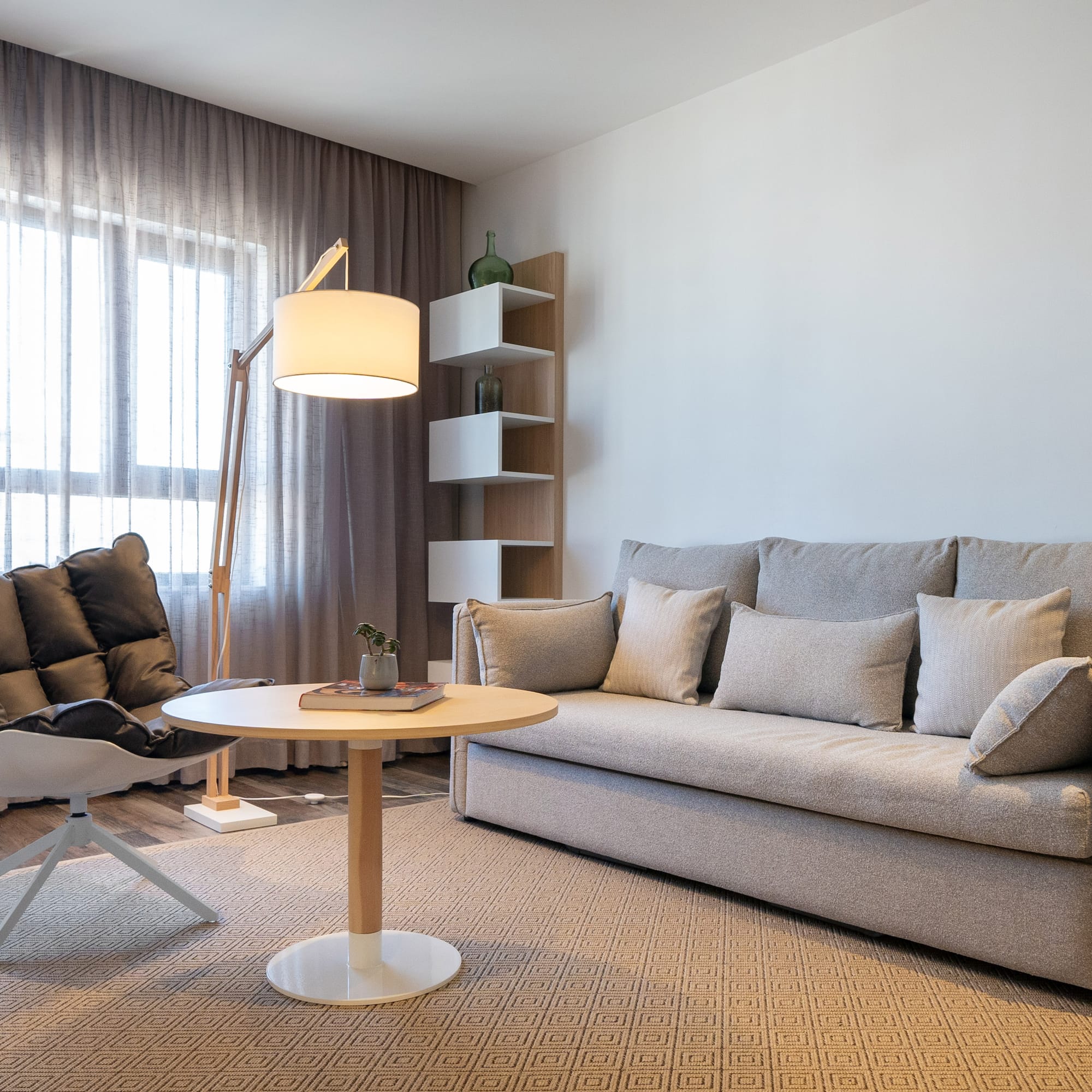 a living room with a couch and a table